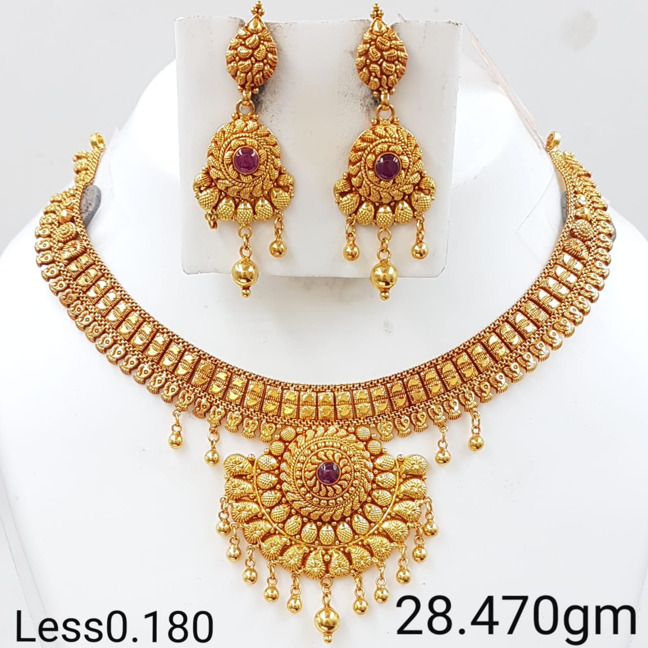 South Indian Gold Wedding Set with Red Gemstone