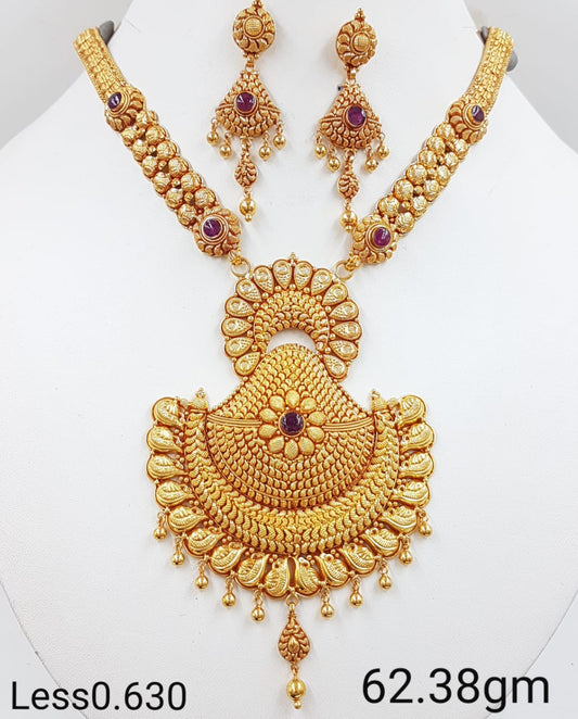 Ornate Gold Necklace Set with Bold Floral Centerpiece