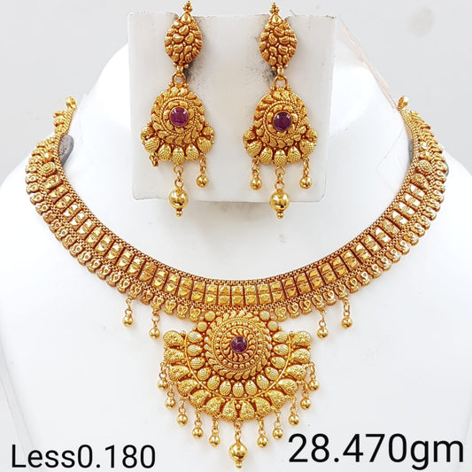 South Indian Gold Wedding Set with Red Gemstone